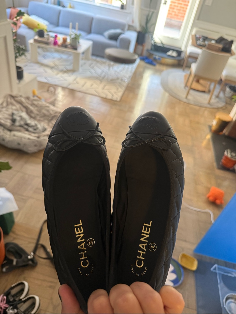CHANEL Black Quilted Leather Ballet Flats with Bow Accent